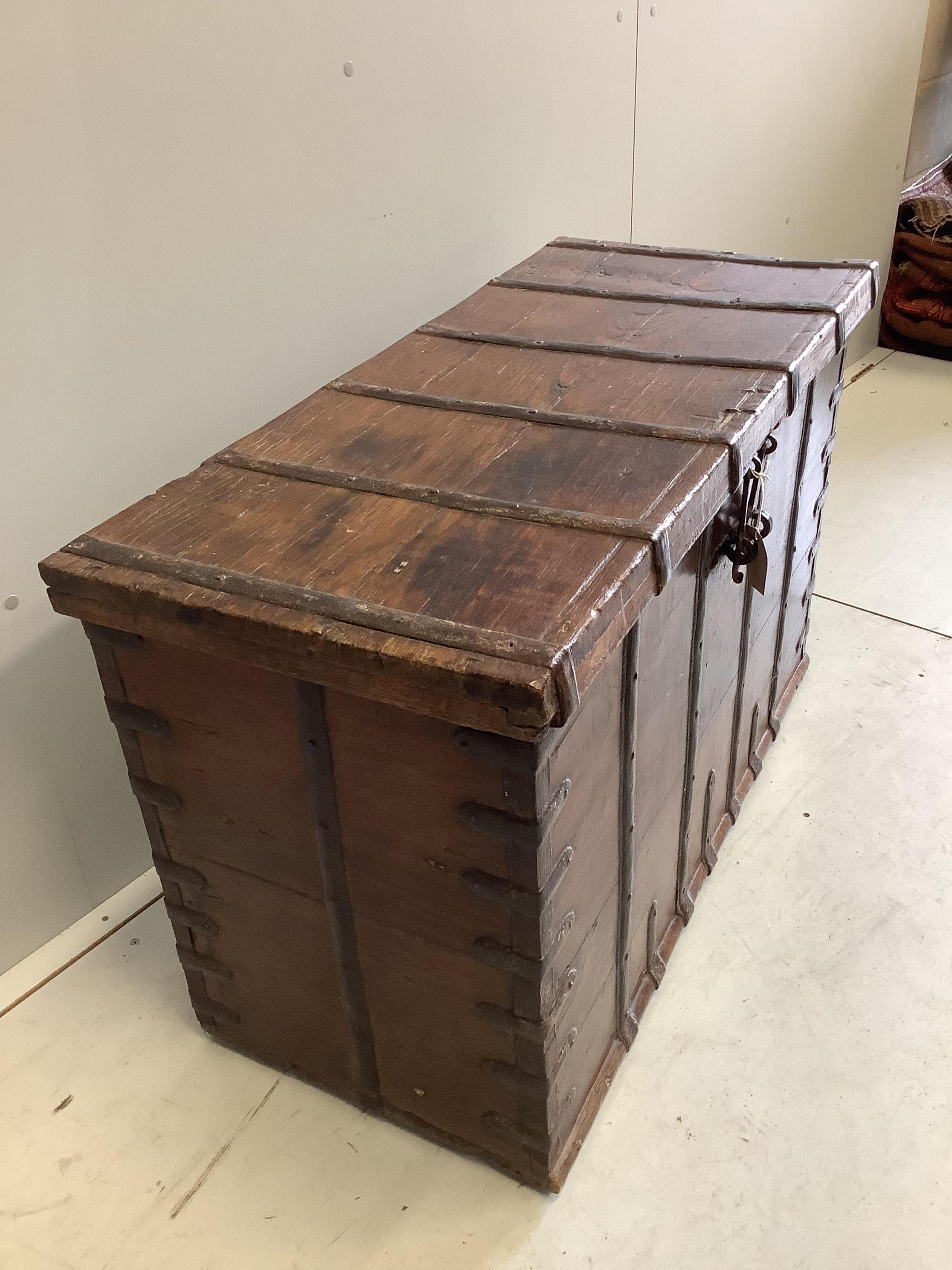 An iron bound hardwood trunk, width 102cm, height 65cm. Condition - fair to good